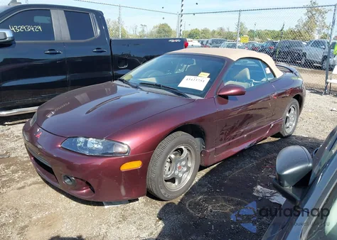 1997 Mitsubishi Eclipse Spyder Gst z USA, uszkodzony, nr VIN 4A3AX55F6VE144878